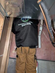 Indoor piping and utility connections prepared for final installation.